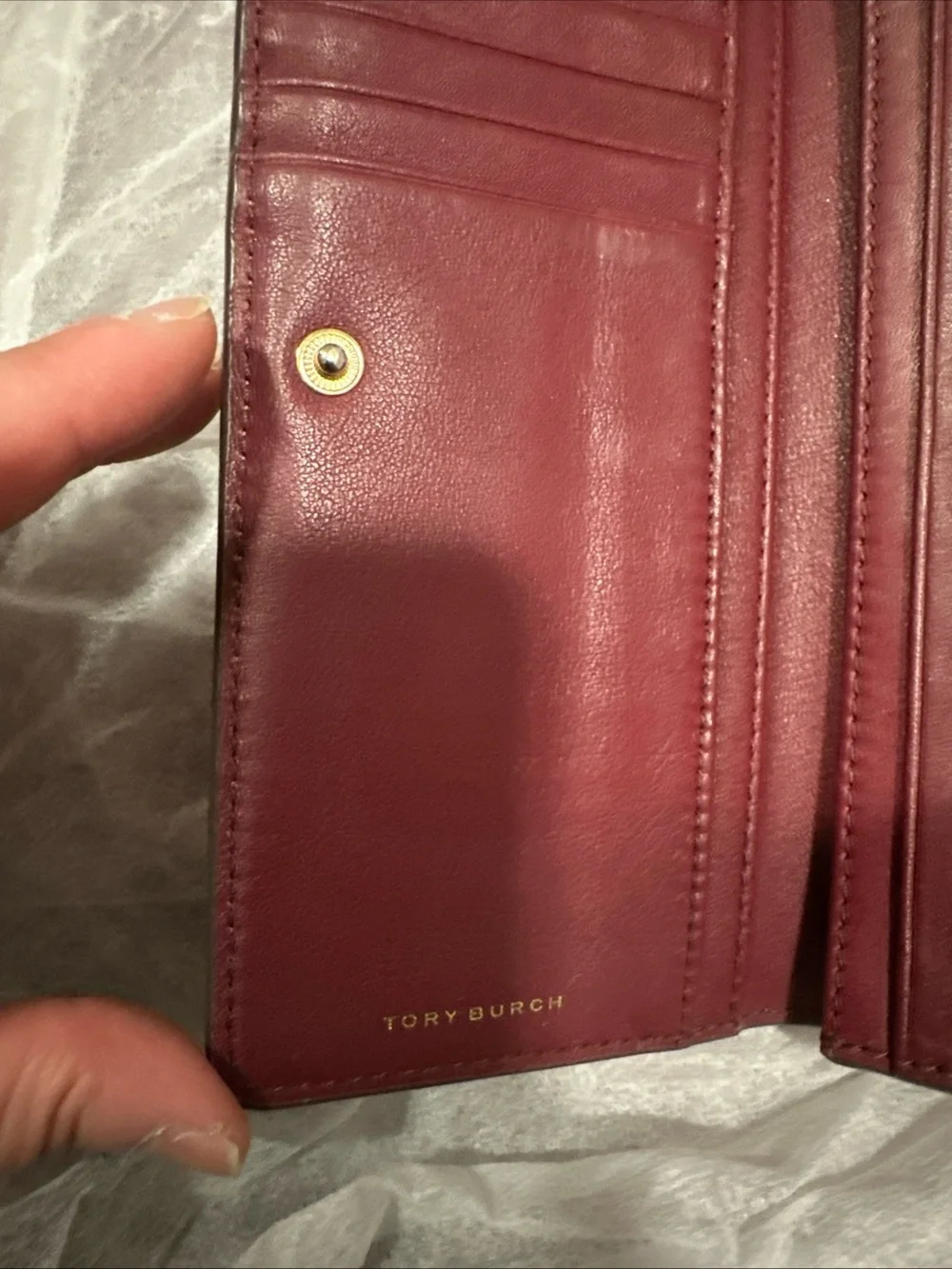 Tory Burch Pebbled Leather Wristlet in Deep Burgundy with Gold Logo